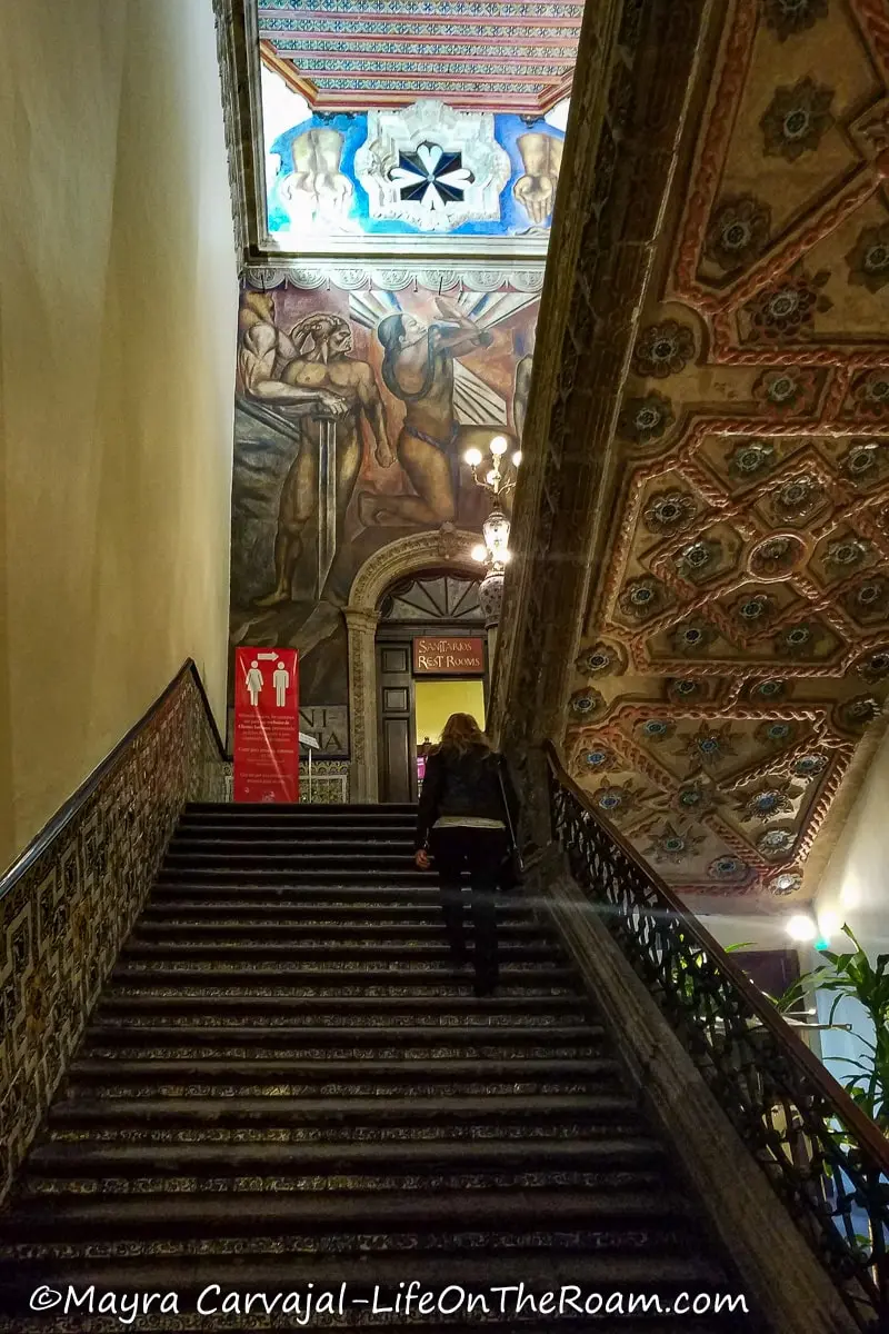 A highly decorated soffit in a wide stair 