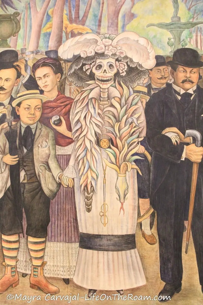 A painting of a well-dressed skeleton next to other people