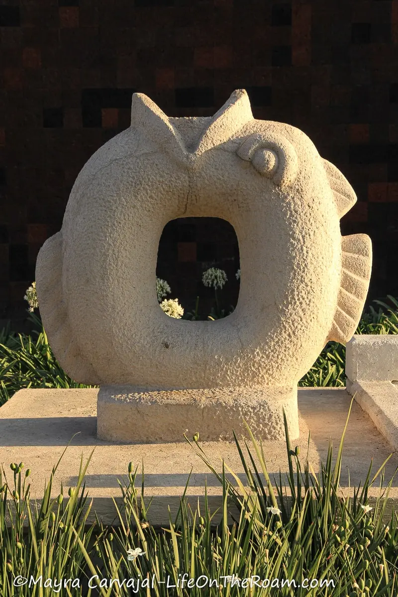 A stone sculpture representing a fish
