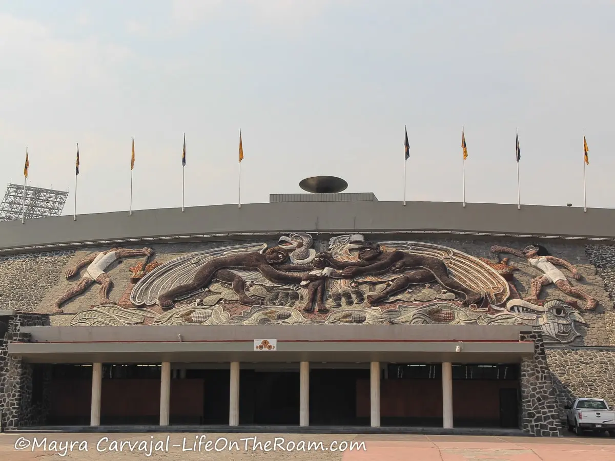 A mural above the entrance of a stadium