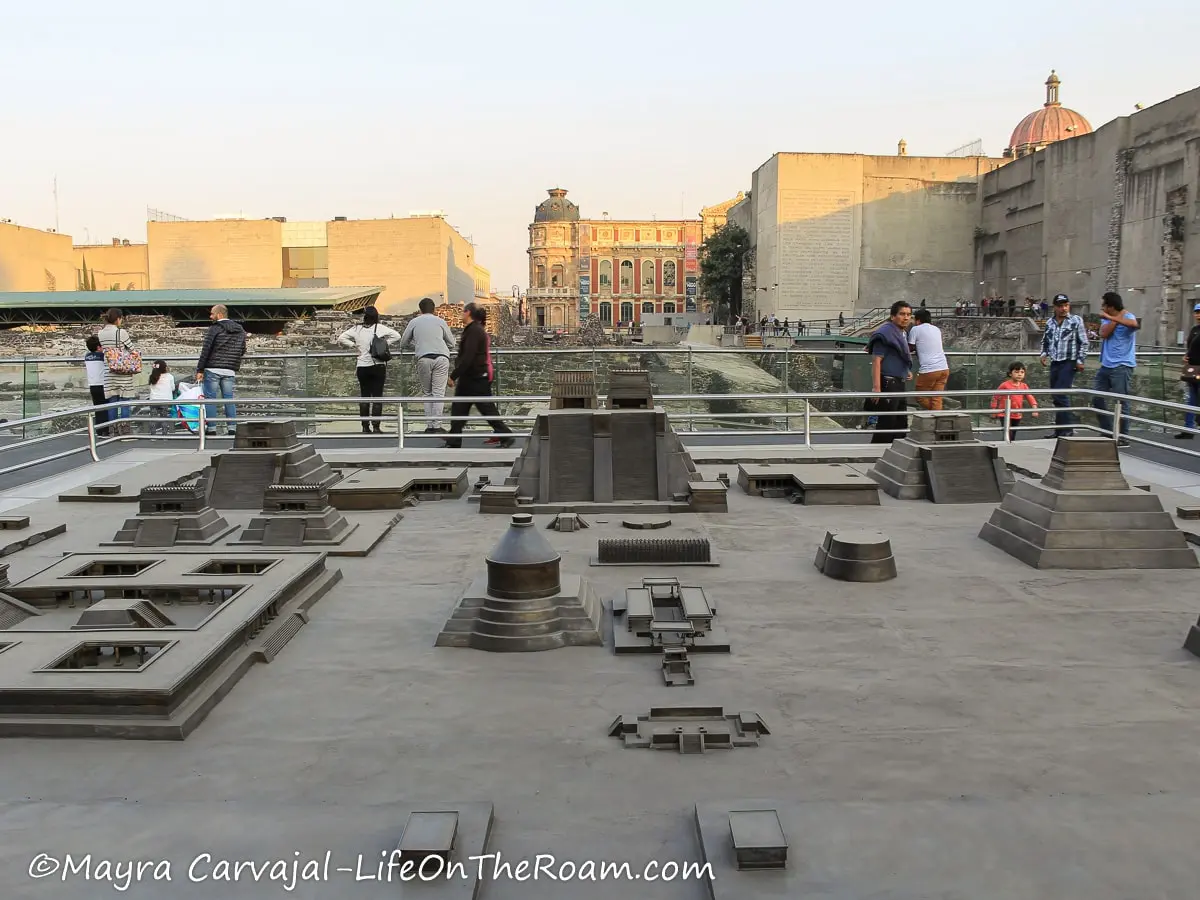 An outdoor scale model showing several pyramids