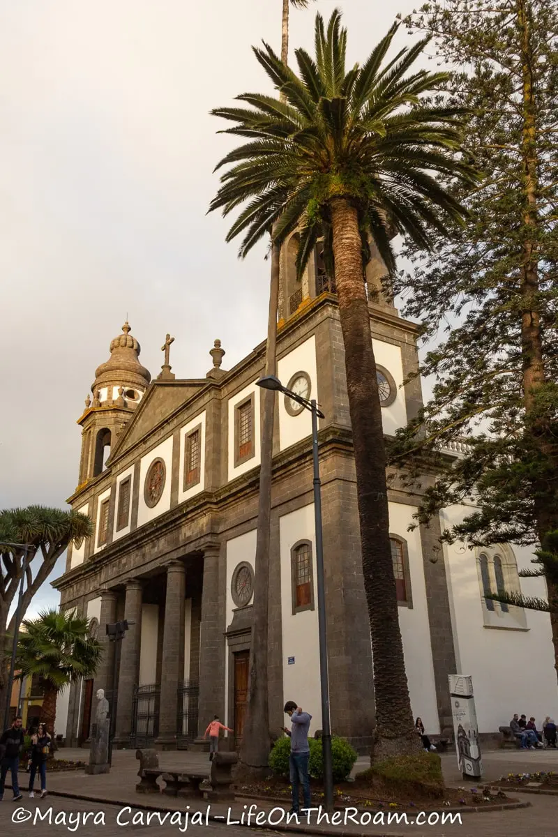 A cathedral with white exterior and stone details