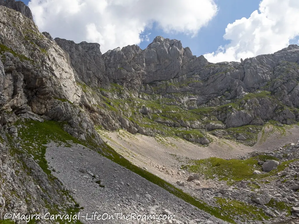 Massive rock formations with scree slopes