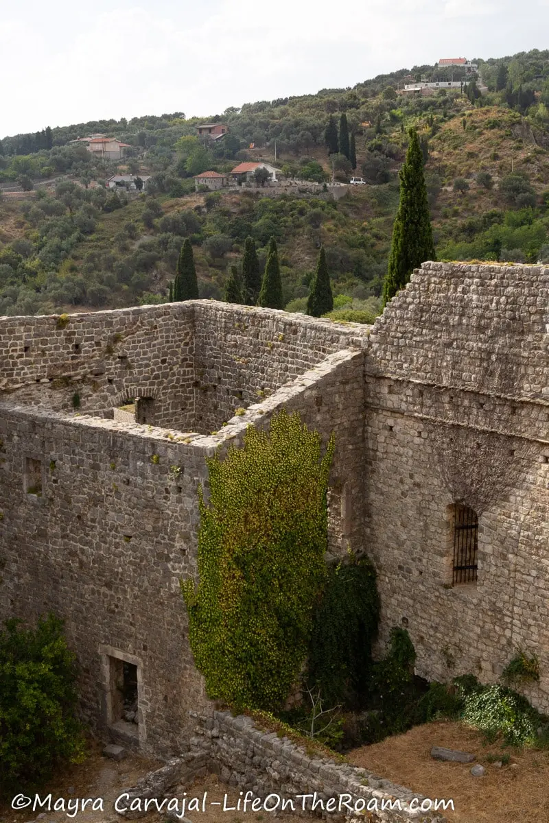 A former citadel with tall walls made of cut stone with the roof gone