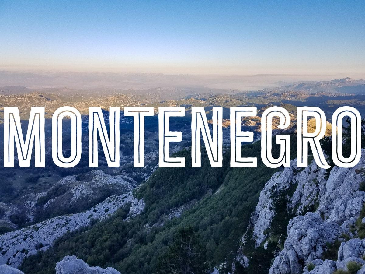 A mountain system that extends in the distance, with the word MONTENEGRO