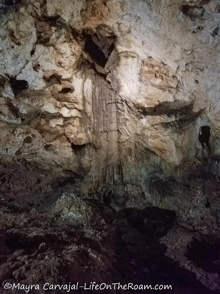 A shape and shade inside a cave resembling a heart