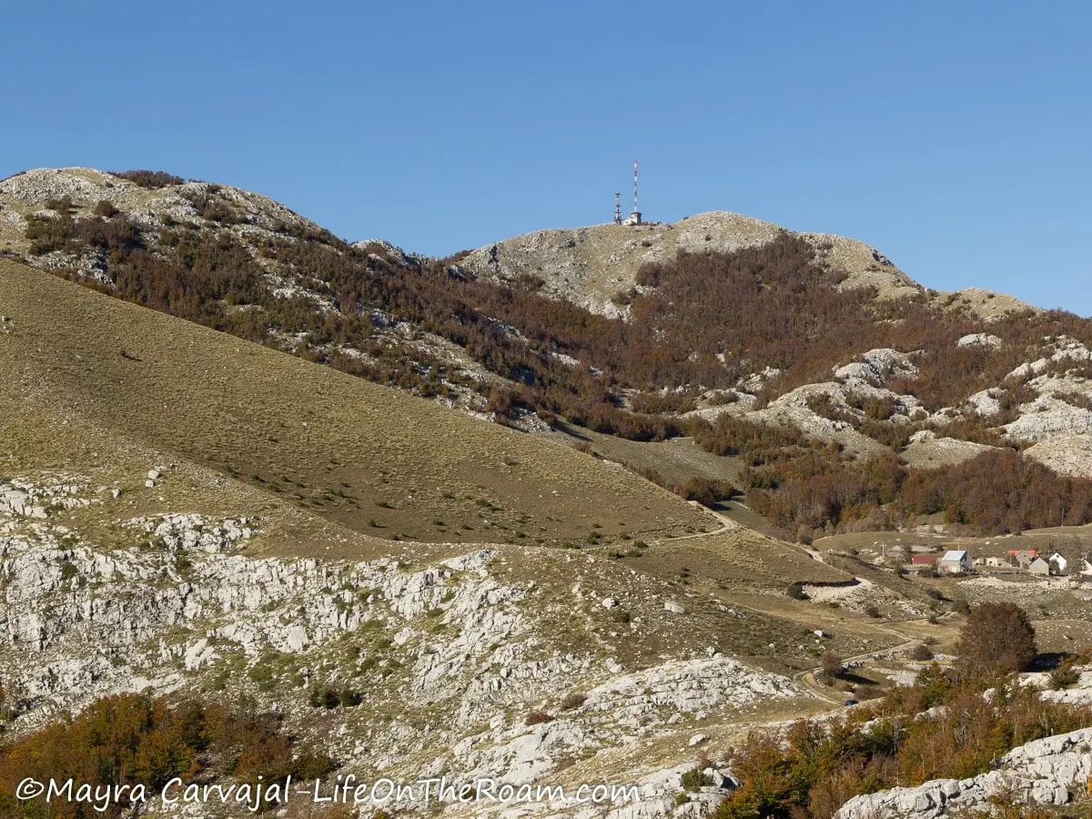 Rolling hills partially covered by vegetation