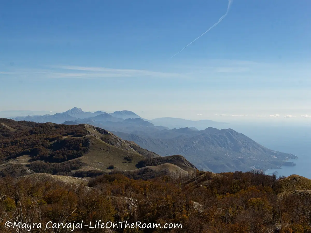 View of a mountainous coastline from a high viewpoint on a clear day