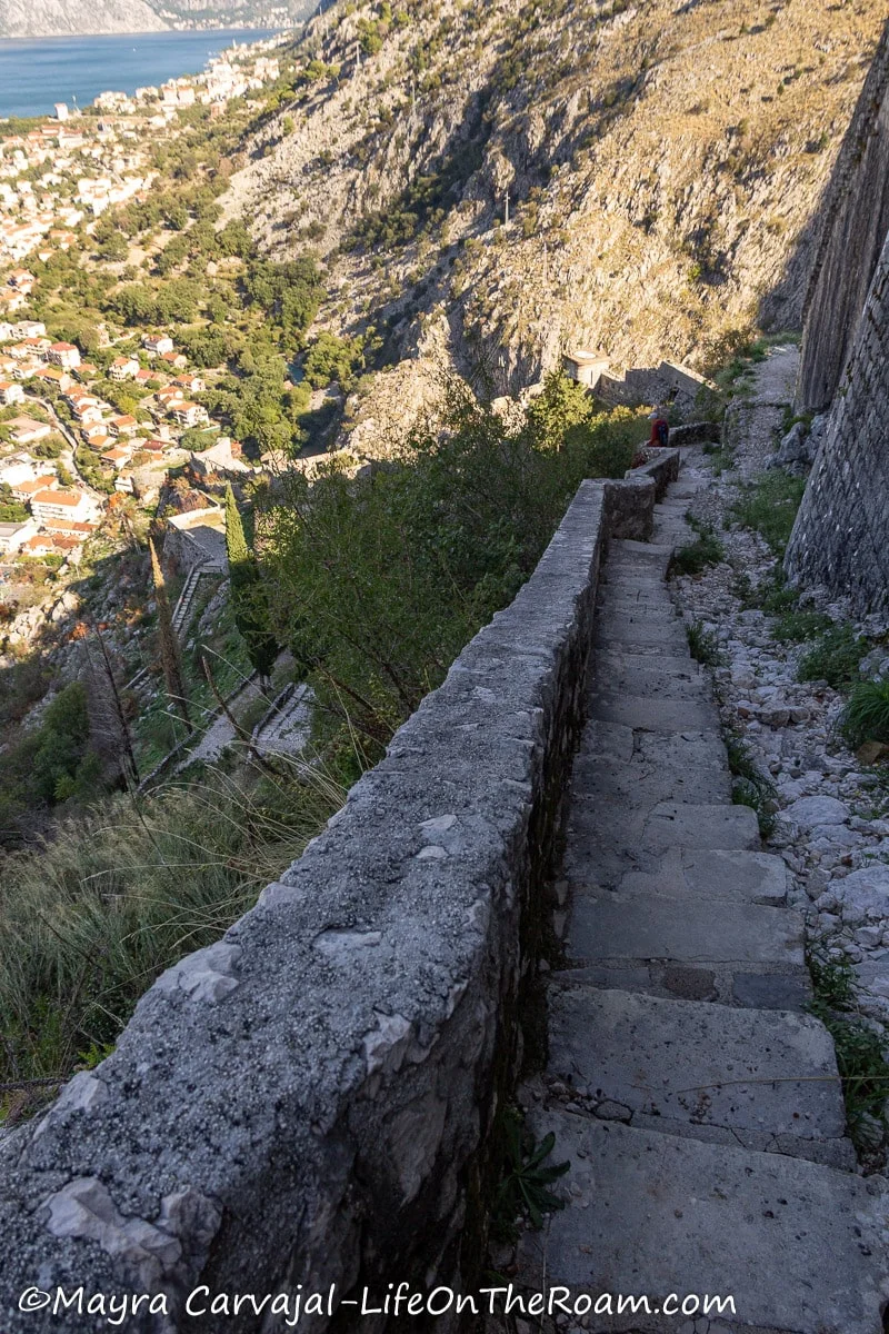 Many narrow stone steps along a steep slope.
