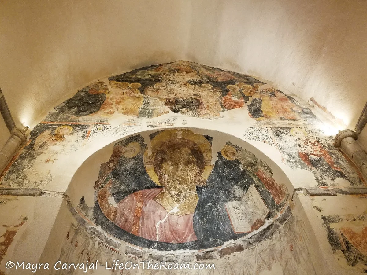 Fragments of an old fresco inside the dome of a church