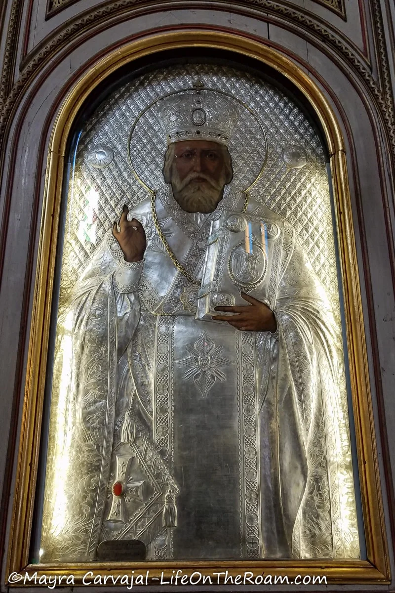 The painting of a Saint covered by an elaborate riza