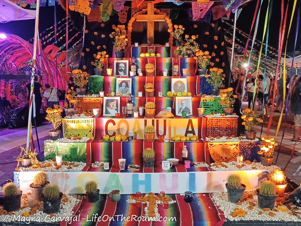 A Day of the Dead altar with cacti and the name "Coahuila"