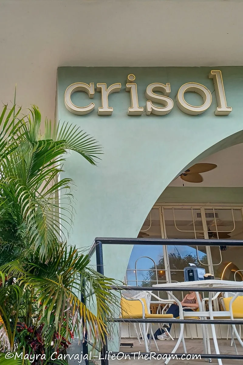 An outer wall with the sign saying Crisol