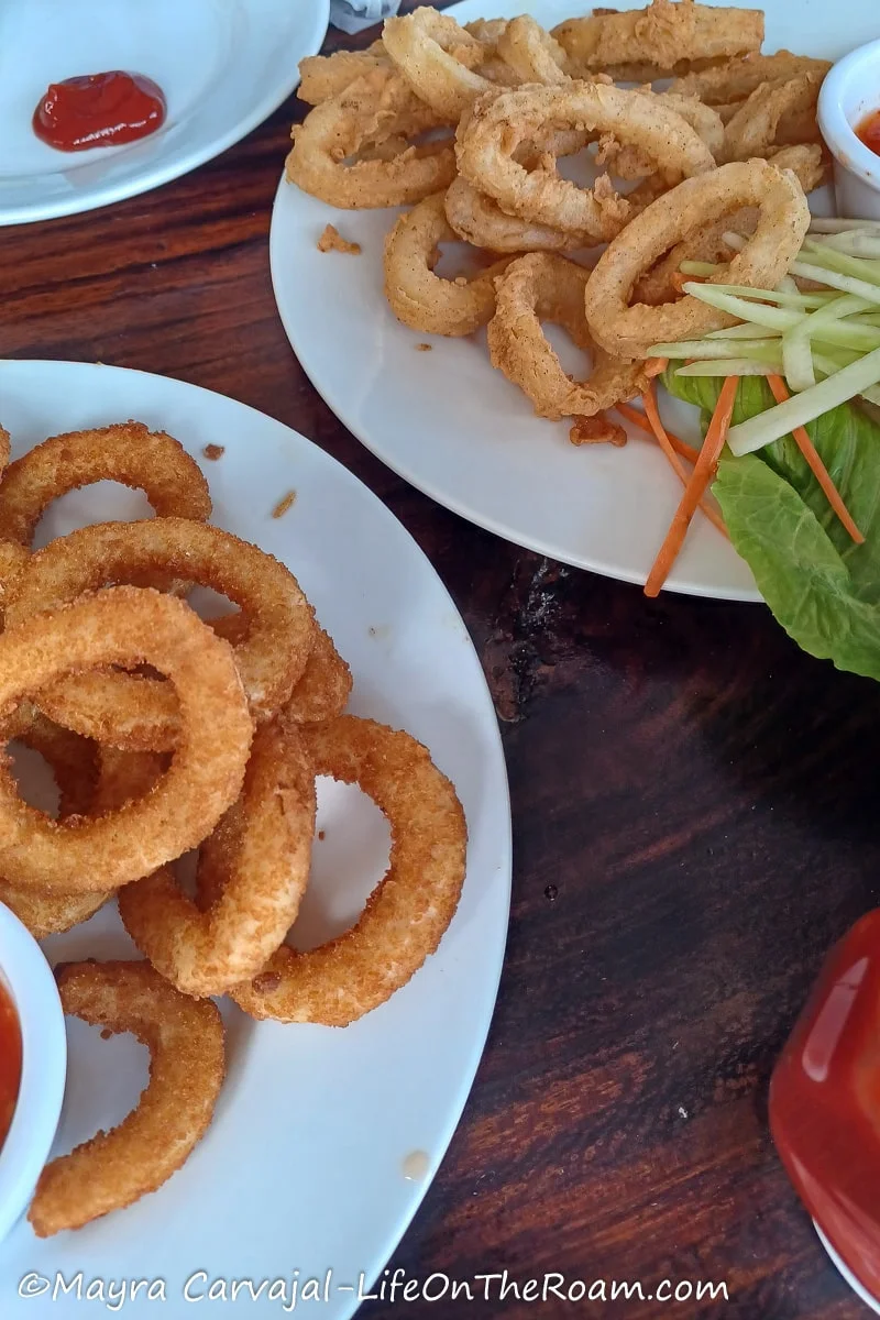 Calamari rings on two white plates