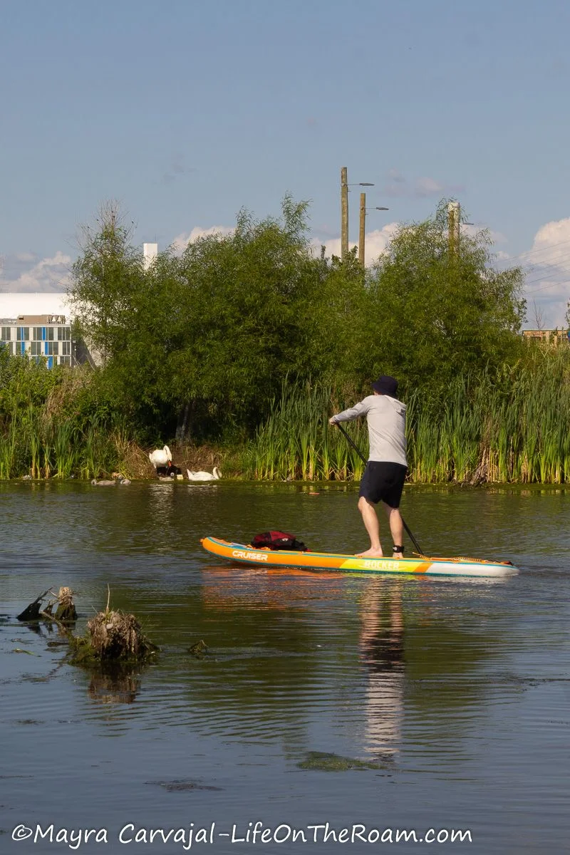 A person on a SUP exploring waterways